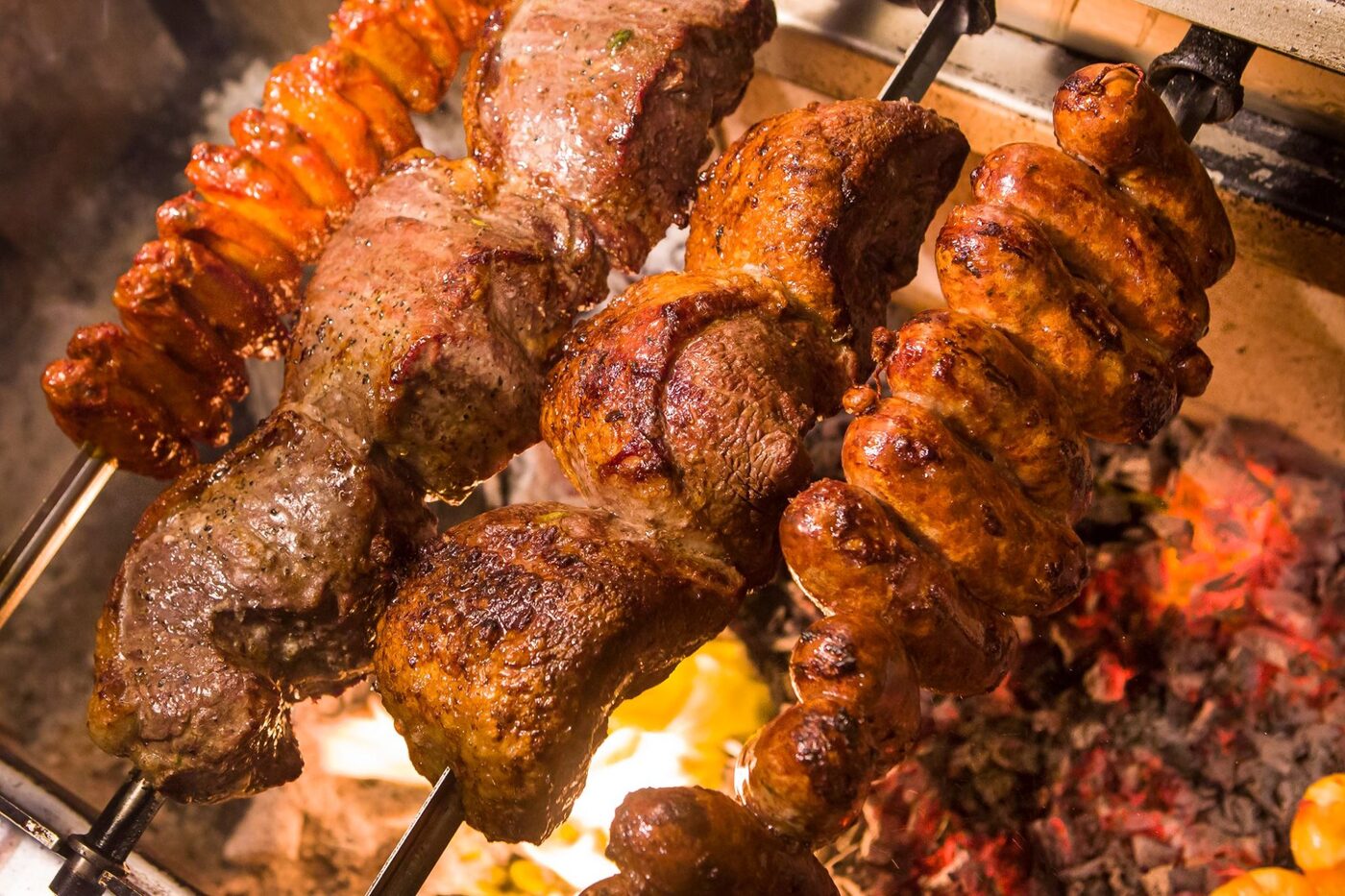 Meats roasting over open flame at Villas Brazil