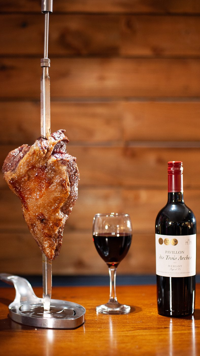 Tomahawk on the spit at Villas Brazil